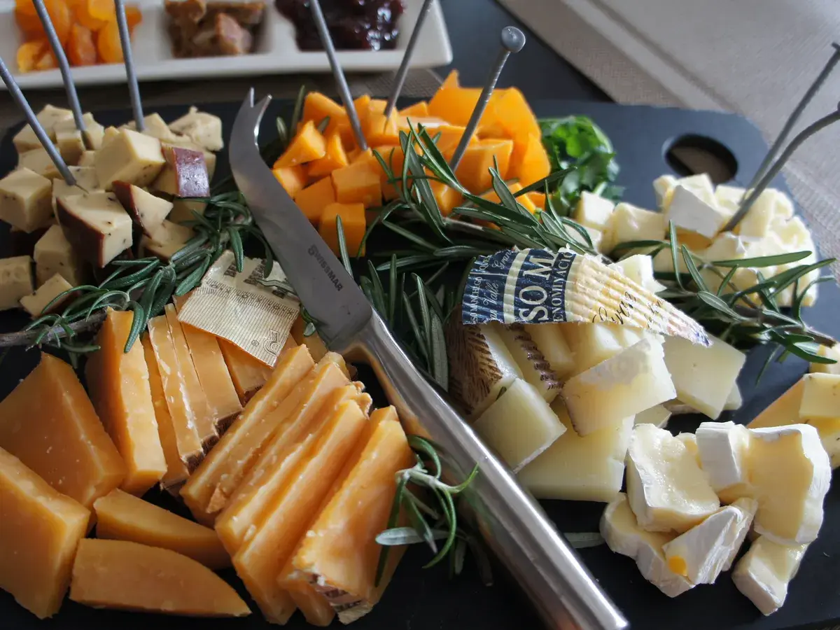 Assorted cheeses with rosemary